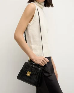 Crest Lock Croc-Embossed Top Handle Bag in Black