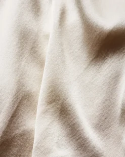 Fernanda Silk Bodysuit in Ivory x Poppy Delevingne